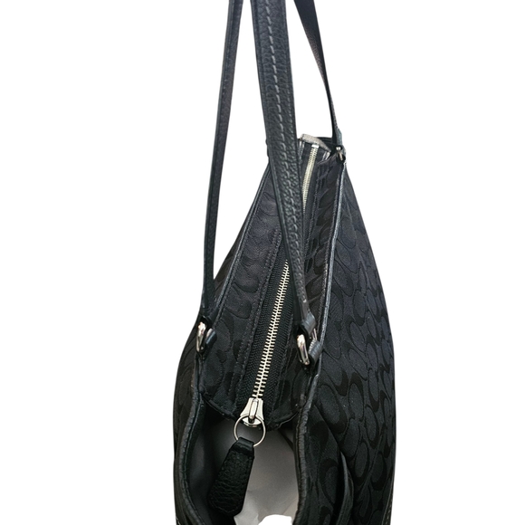 This is a Coach Park Signature Carrie Tote in Black - Picture 9 of 14